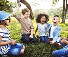 Kids sitting in a circle