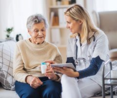 Nurse with elderly patient