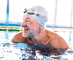 edlerly man in swimming pool