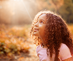 Child looking at glowing light