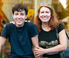 Mother and son smiling