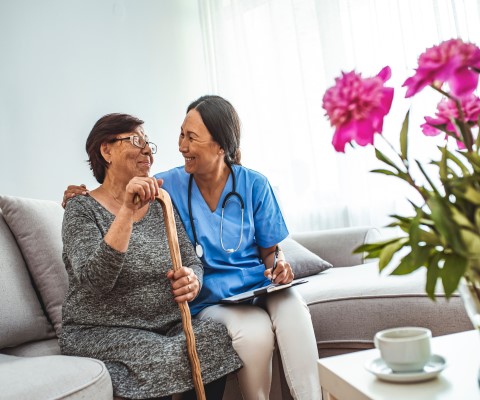 care provider sitting with patient