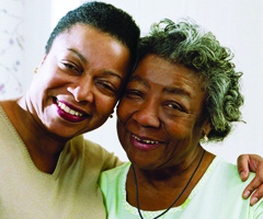 Two women smiling