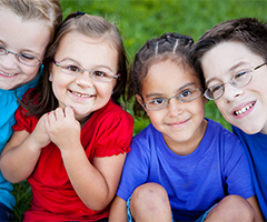 Four children smiling