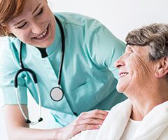 Nurse with elderly patient