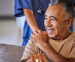 Medical staff supporting patient