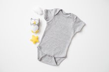 Baby onesie and toys