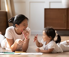 Mother and daughter drawing