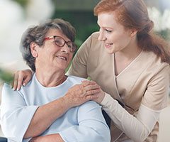 Nurse comforting patient