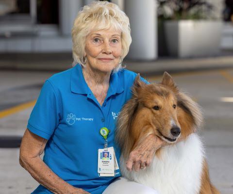 Lee Health Volunteer with her Dog