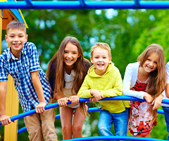 Children smiling at playground