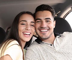 Man and woman smiling