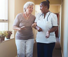 Nurse walking with patient