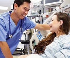 Nurse laughing with patient