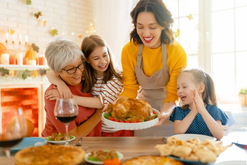 A family eating thanksgiving dinner together