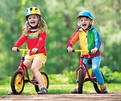 Children riding colorful bikes