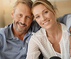 Man and woman smiling