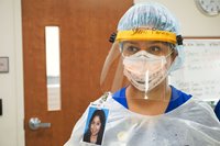 A Nurse Dressed in Full Personal Protective Equipment