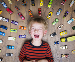 Little boy with toy cars