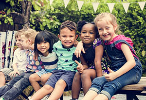 Children sitting on bench