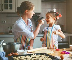 Mother and daughter baking